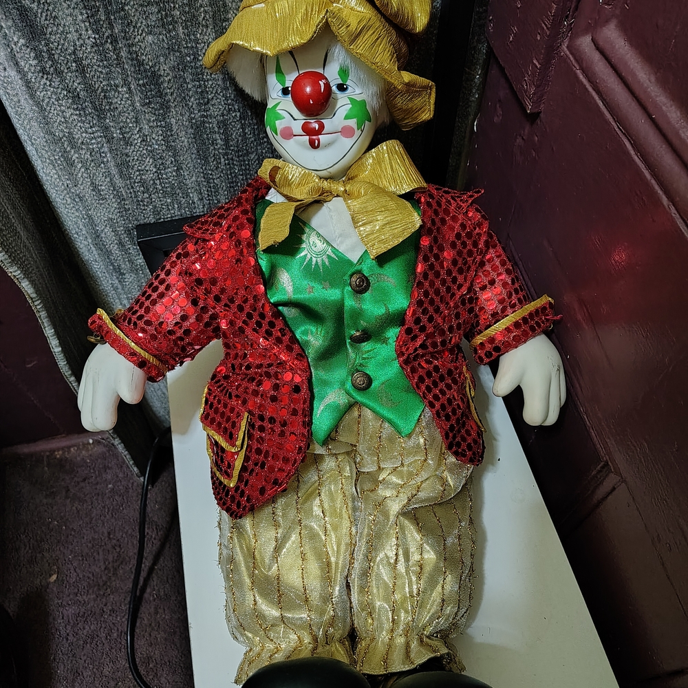 Festive Clown Doll with Red and Gold Outfit